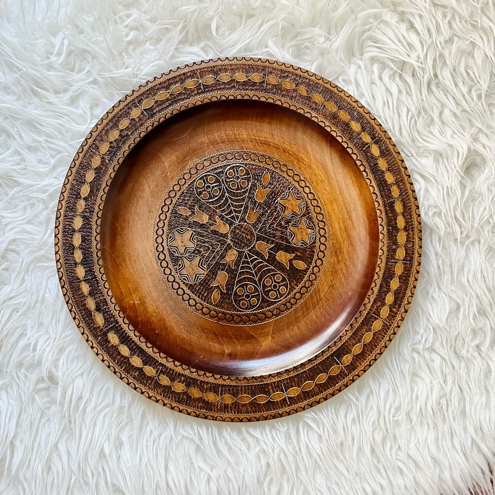 Vintage wooden plate with brass inlay